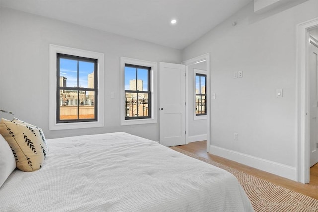 bedroom with light hardwood / wood-style flooring