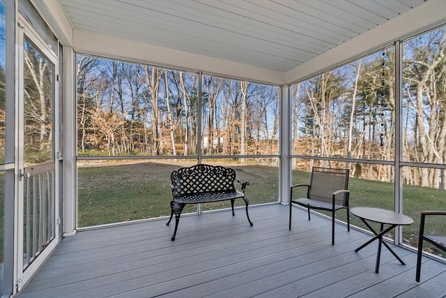 sunroom / solarium featuring wooden ceiling