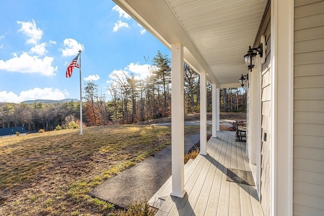 wooden deck featuring covered porch