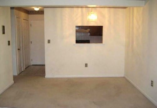 view of carpeted spare room