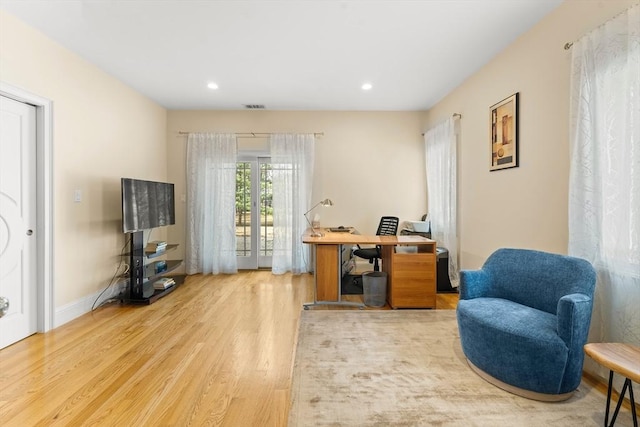 office with visible vents, recessed lighting, wood finished floors, and baseboards