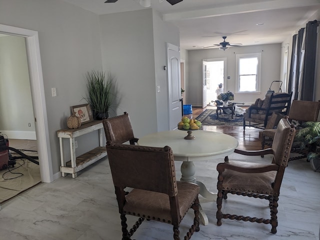 dining space featuring ceiling fan