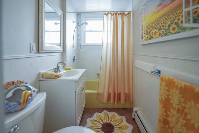 full bathroom featuring baseboard heating, tile patterned floors, toilet, shower / bath combo with shower curtain, and vanity