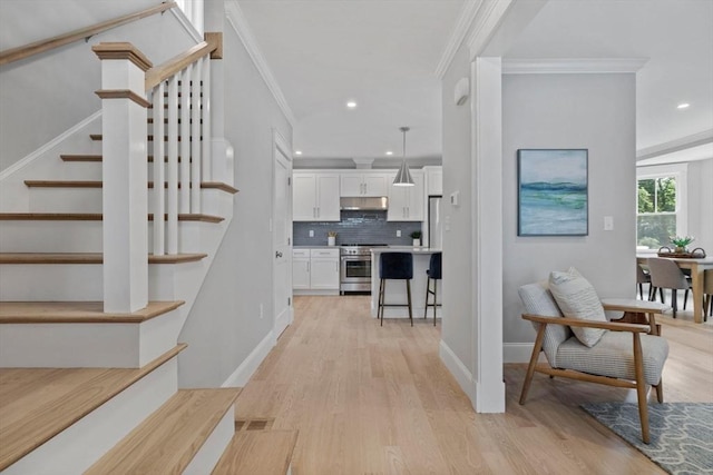 73 Knoll St Unit 73, Boston, MA 02131 - stairs with ornamental molding, wood finished floors, and recessed lighting