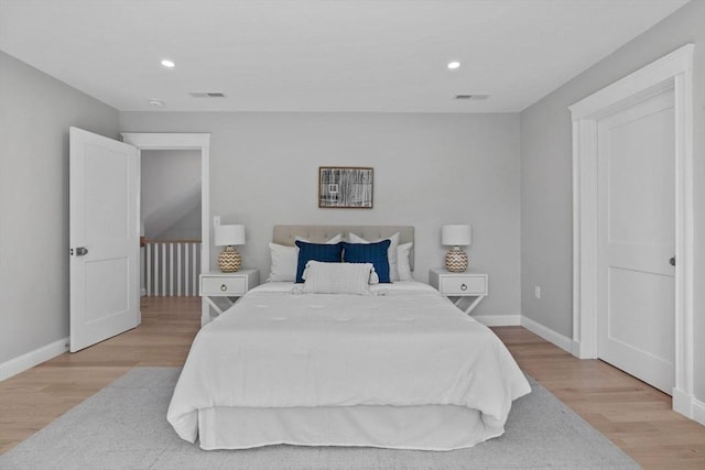 73 Knoll St Unit 73, Boston, MA 02131 - bedroom with light wood-type flooring and recessed lighting