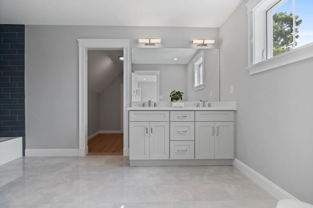 73 Knoll St Unit 73, Boston, MA 02131 - bathroom featuring double vanity, plenty of natural light, marble finish flooring, and a shower