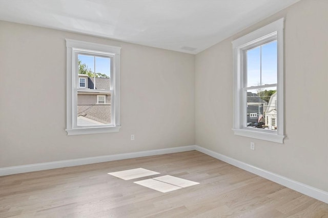 73 Knoll St Unit 73, Boston, MA 02131 - spare room with light wood-style floors and baseboards