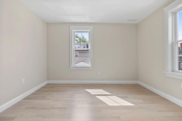 73 Knoll St Unit 73, Boston, MA 02131 - empty room with light wood-type flooring and baseboards