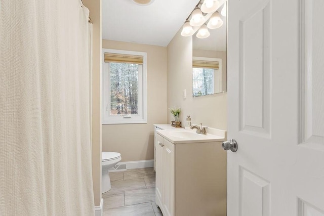 full bathroom with visible vents, toilet, vanity, and baseboards