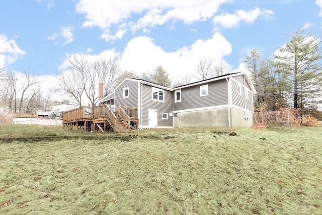 rear view of property with a deck