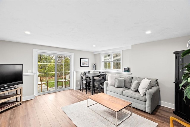 54 Sunflower Way, Plymouth, MA 02360 - living area featuring healthy amount of natural light, recessed lighting, wood finished floors, and baseboards