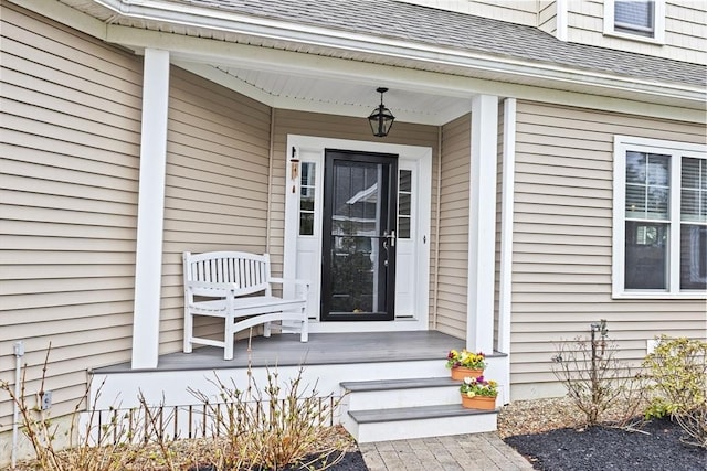 54 Sunflower Way, Plymouth, MA 02360 - doorway to property featuring a porch and a shingled roof