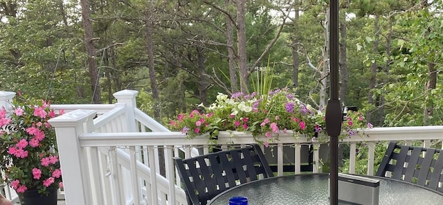 54 Sunflower Way, Plymouth, MA 02360 - view of wooden balcony with outdoor dining space and a wooden deck
