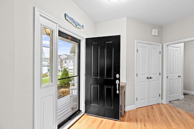 54 Sunflower Way, Plymouth, MA 02360 - foyer entrance with light wood-style floors and baseboards