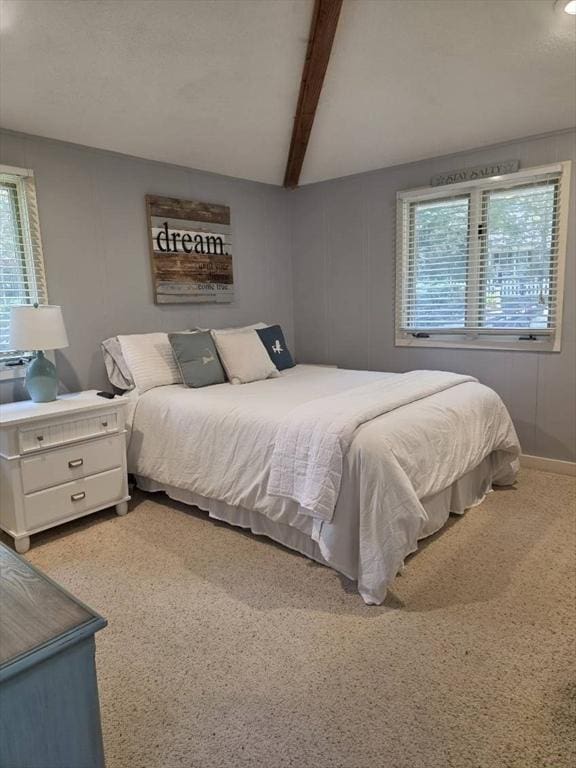 233 Hoopdole Rd, Mashpee, MA 02649 - carpeted bedroom with multiple windows and beam ceiling