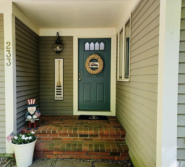 233 Hoopdole Rd, Mashpee, MA 02649 - view of exterior entry featuring a porch