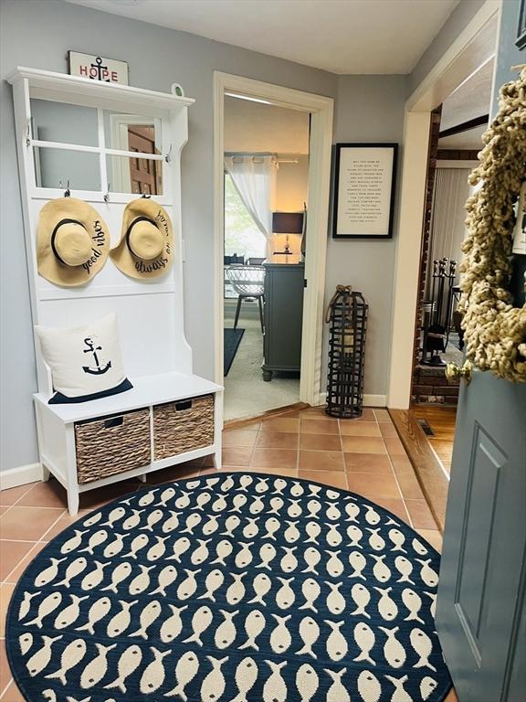 233 Hoopdole Rd, Mashpee, MA 02649 - mudroom featuring tile patterned flooring and baseboards