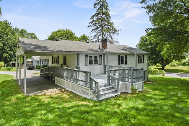 35 Woodland Rd, Leominster, MA 01453 - back of property featuring a chimney, a yard, and a shingled roof