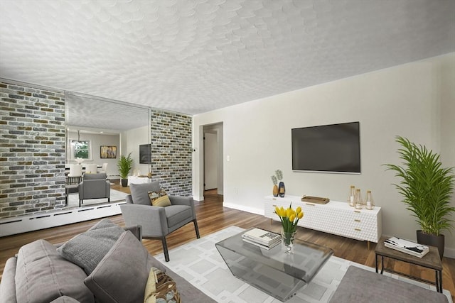 35 Woodland Rd, Leominster, MA 01453 - living room with wood finished floors and a textured ceiling