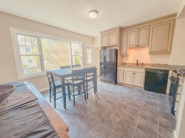 68 Forest St, Lowell, MA 01851 - dining space with baseboards and light tile patterned floors