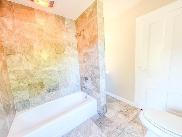 68 Forest St, Lowell, MA 01851 - bathroom with toilet and washtub / shower combination