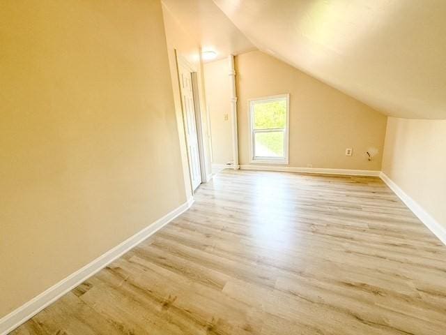 68 Forest St, Lowell, MA 01851 - bonus room with light wood-style floors and lofted ceiling