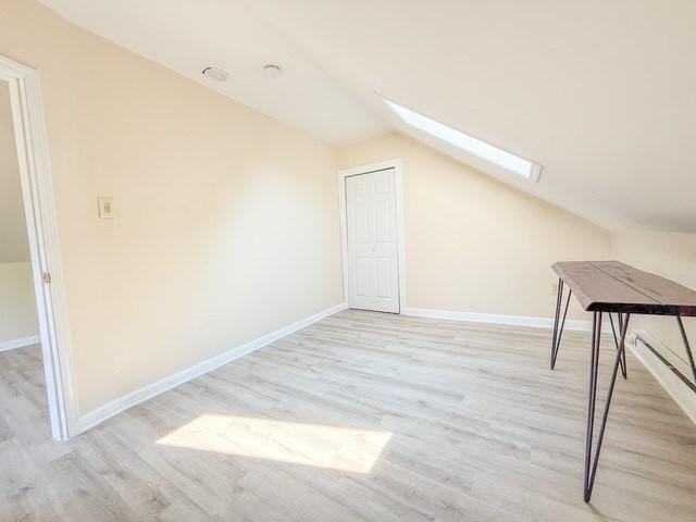68 Forest St, Lowell, MA 01851 - bonus room with a skylight, lofted ceiling, and light wood finished floors