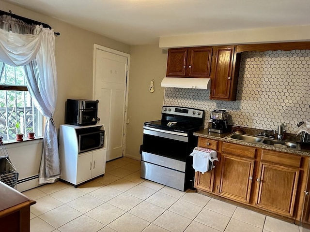 334 Howard St Unit 5, Lawrence, MA 01841 - kitchen featuring stainless steel electric range oven, custom exhaust hood, black microwave, tasteful backsplash, and dark countertops