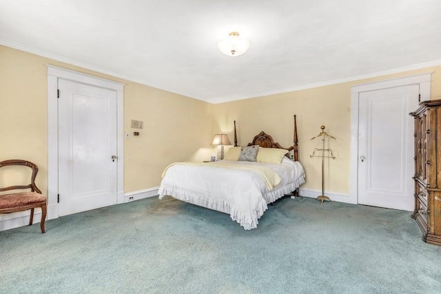 carpeted bedroom featuring crown molding