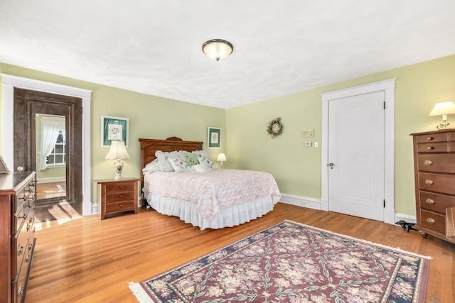 bedroom with light hardwood / wood-style floors