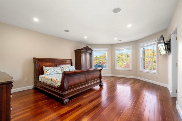 bedroom featuring dark hardwood / wood-style floors