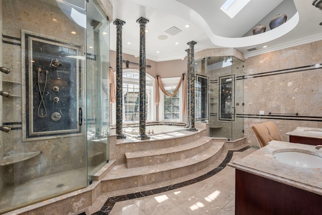 bathroom with vanity, ornamental molding, and separate shower and tub