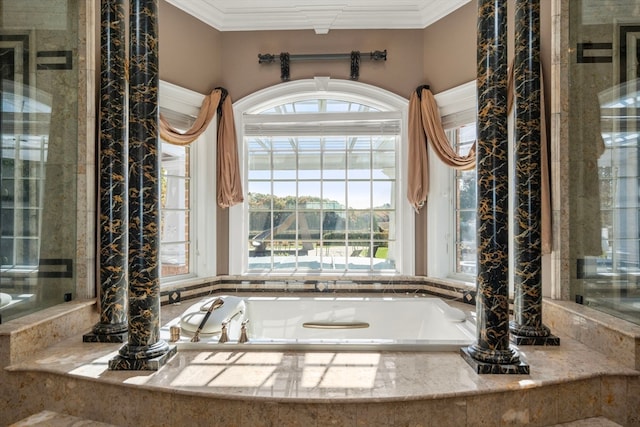 bathroom with crown molding and tiled bath