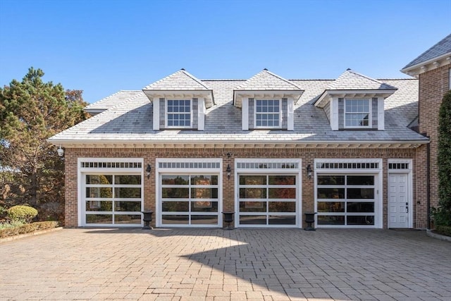 150 Horseneck Rd, Dartmouth, MA 02748 - view of front of property featuring brick siding, a garage, and a high end roof