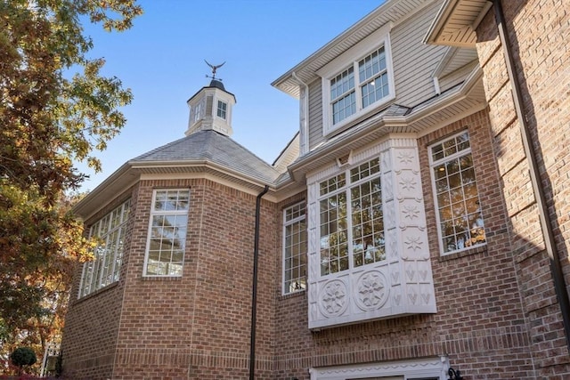 150 Horseneck Rd, Dartmouth, MA 02748 - view of side of home with brick siding
