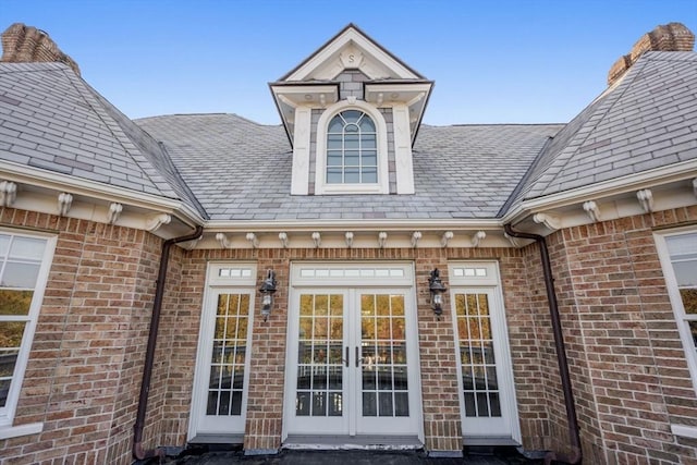 150 Horseneck Rd, Dartmouth, MA 02748 - entrance to property featuring french doors and brick siding