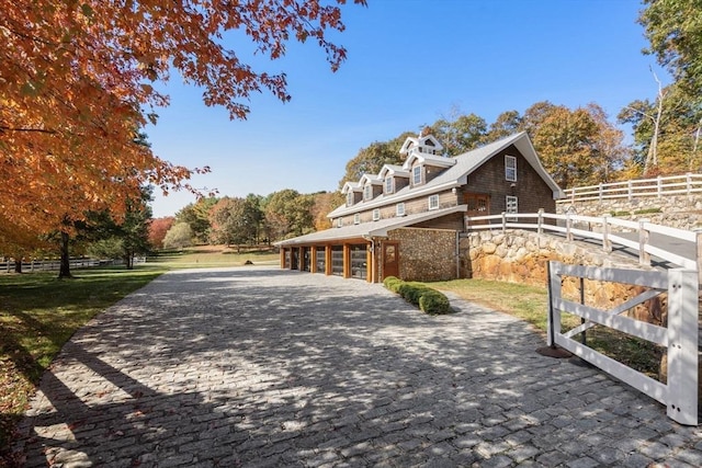 150 Horseneck Rd, Dartmouth, MA 02748 - view of side of home with decorative driveway and stone siding