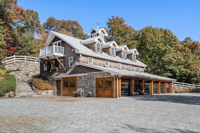 150 Horseneck Rd, Dartmouth, MA 02748 - shingle-style home featuring a balcony and stone siding