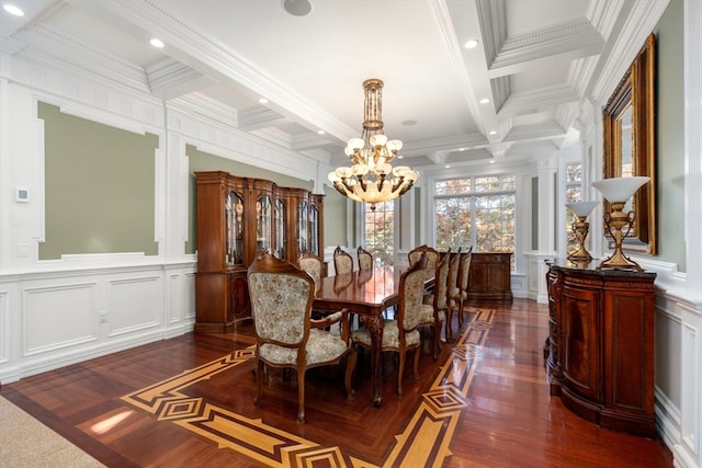 dining area with beam ceiling, ornamental molding, and dark hardwood / wood-style flooring