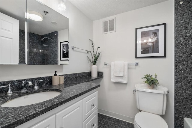 full bath featuring a shower, baseboards, toilet, and vanity