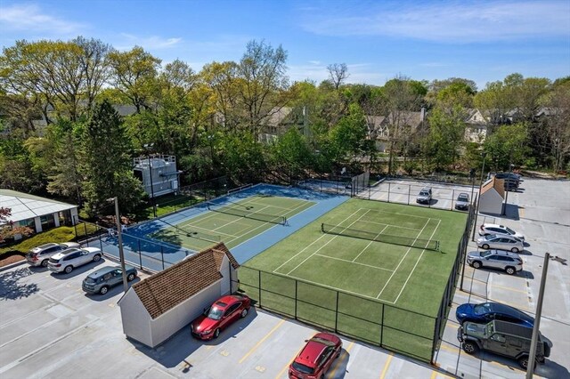 view of tennis court with fence