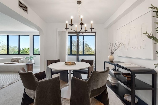 dining room with a chandelier