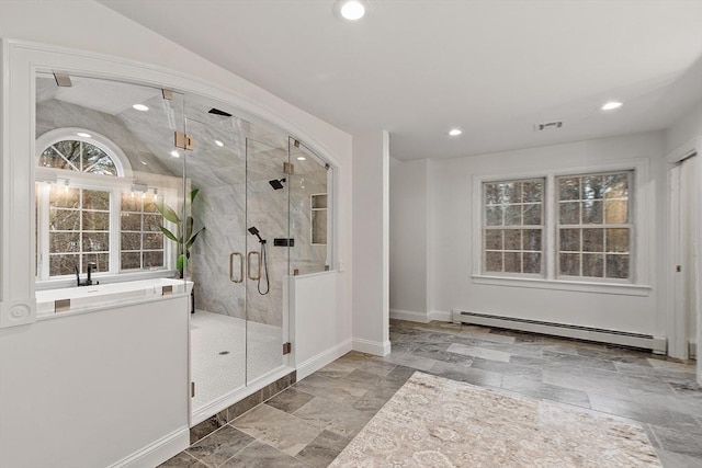 261 E St, Foxboro, MA 02035 - bathroom with a baseboard heating unit, a shower stall, recessed lighting, and stone finish floors