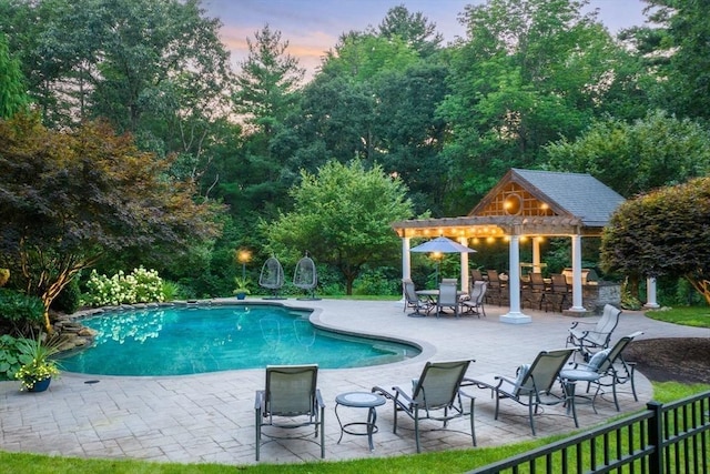 261 E St, Foxboro, MA 02035 - pool at dusk featuring a gazebo, an outdoor pool, and a patio