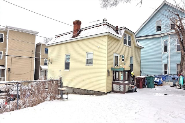 view of snow covered property