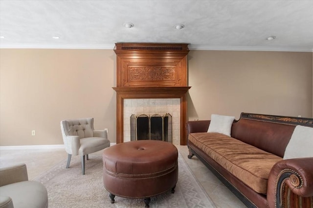 living room with recessed lighting, ornamental molding, light tile patterned floors, and a fireplace