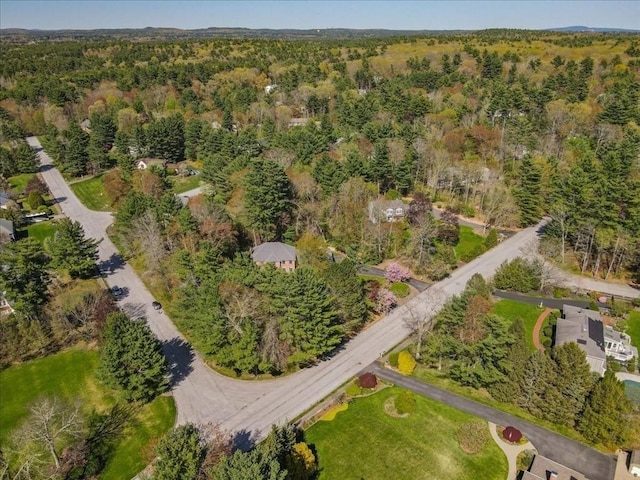 aerial view featuring a view of trees