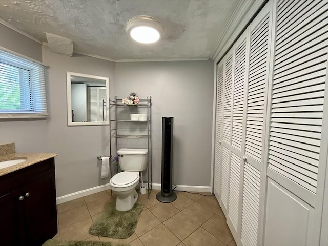 412 Worcester St, West Boylston, MA 01583 - bathroom with vanity, ornamental molding, tile patterned flooring, and a closet