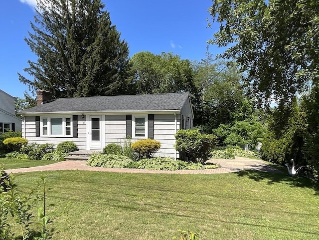 412 Worcester St, West Boylston, MA 01583 - view of front of home with a front lawn, a chimney, and roof with shingles