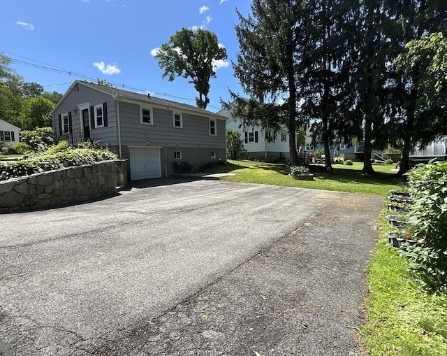 412 Worcester St, West Boylston, MA 01583 - view of front facade featuring driveway, an attached garage, and a front yard